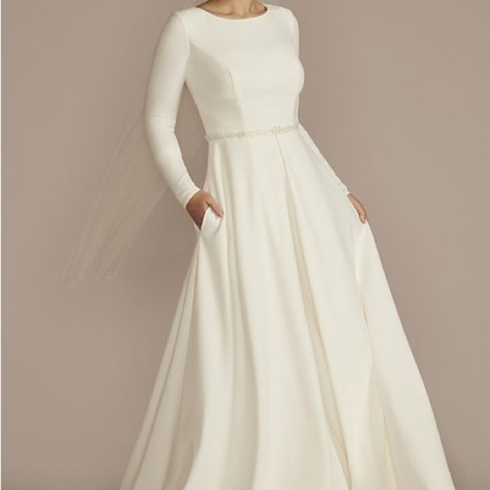 Belted long sleeve crepe modest wedding dress

STYLE# MSLWG4098